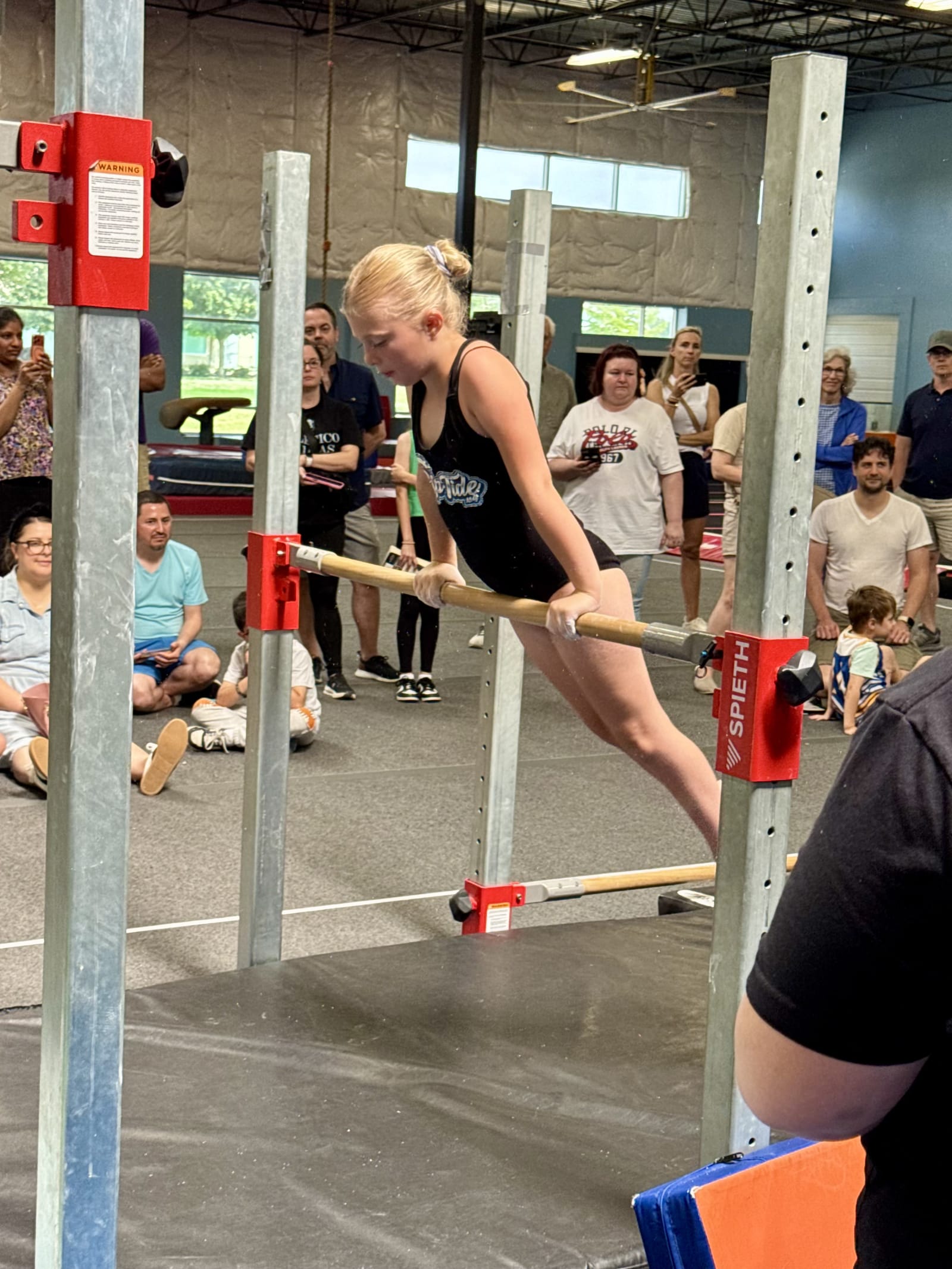 Young gymnast enjoying practice